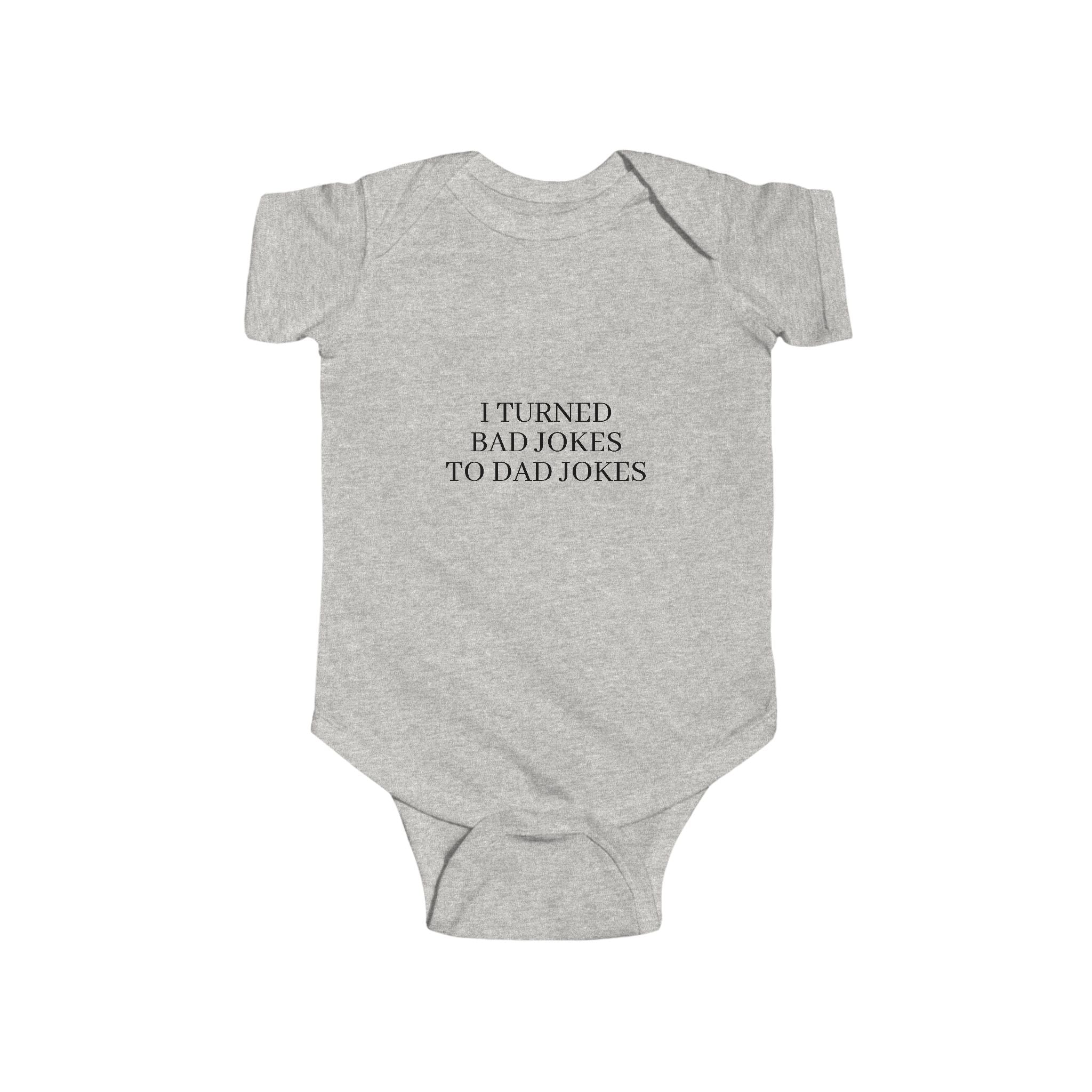 Infant “I TURN BAD JOKES TO DAD JOKES” Fine Jersey Bodysuit